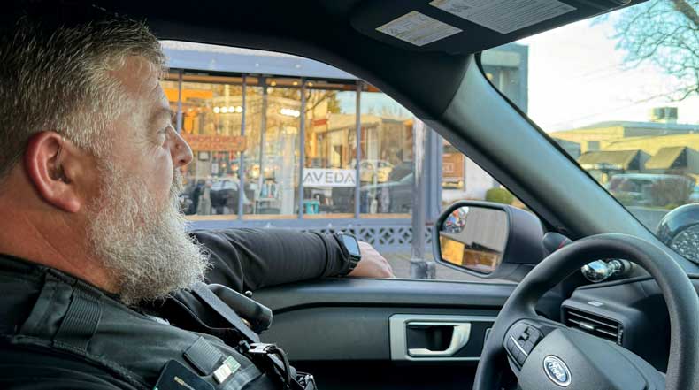 Officer Adam from the Gresham Police Department drives through town while on patrol shift.